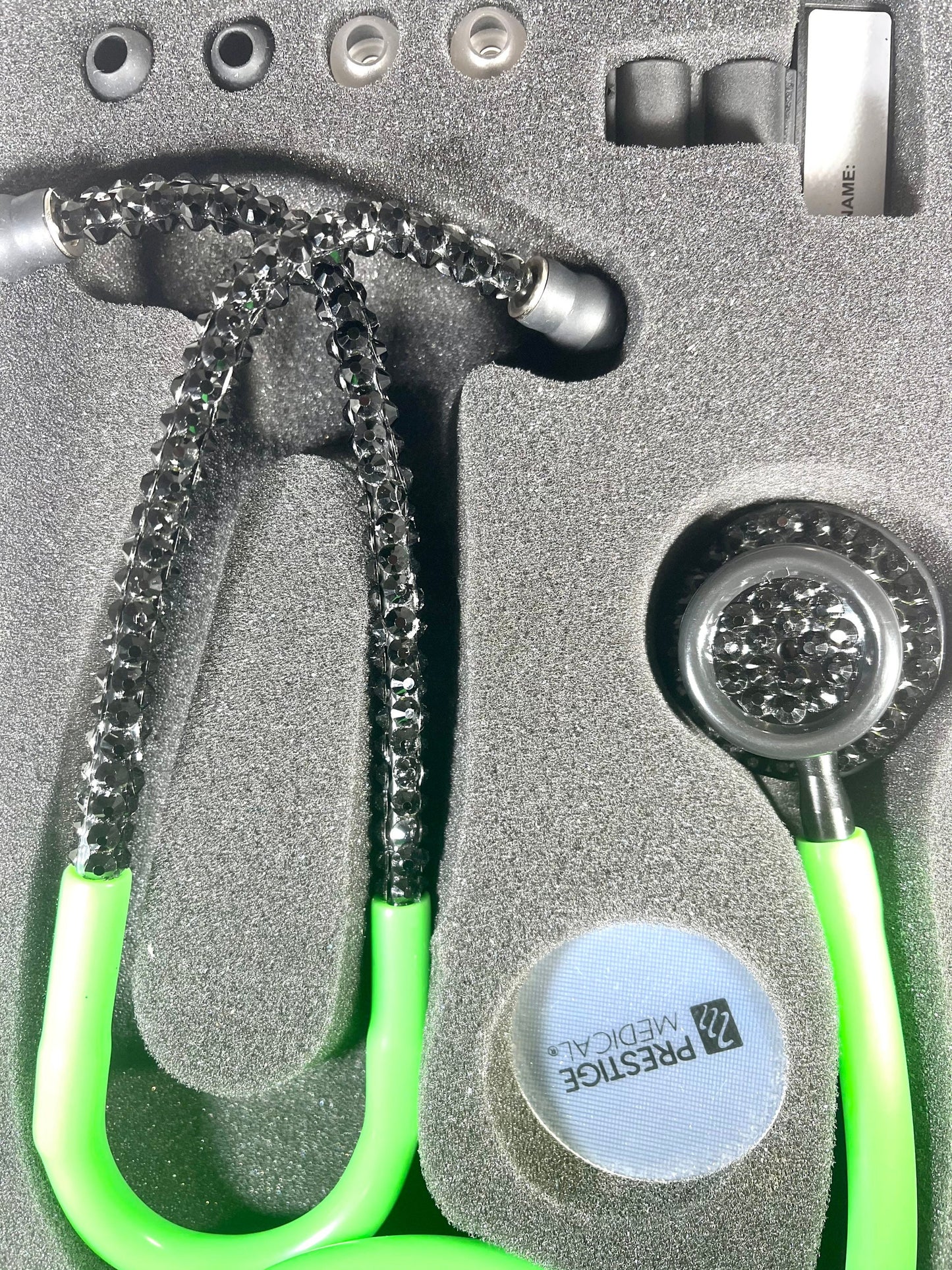 Prestige Medical Stethoscope, Model 121, Neon Green color tubing, individually placed Black rhinestones on the Black Finish chest piece and headset designed by Blingbykey. See other listings for custom protection hard case.