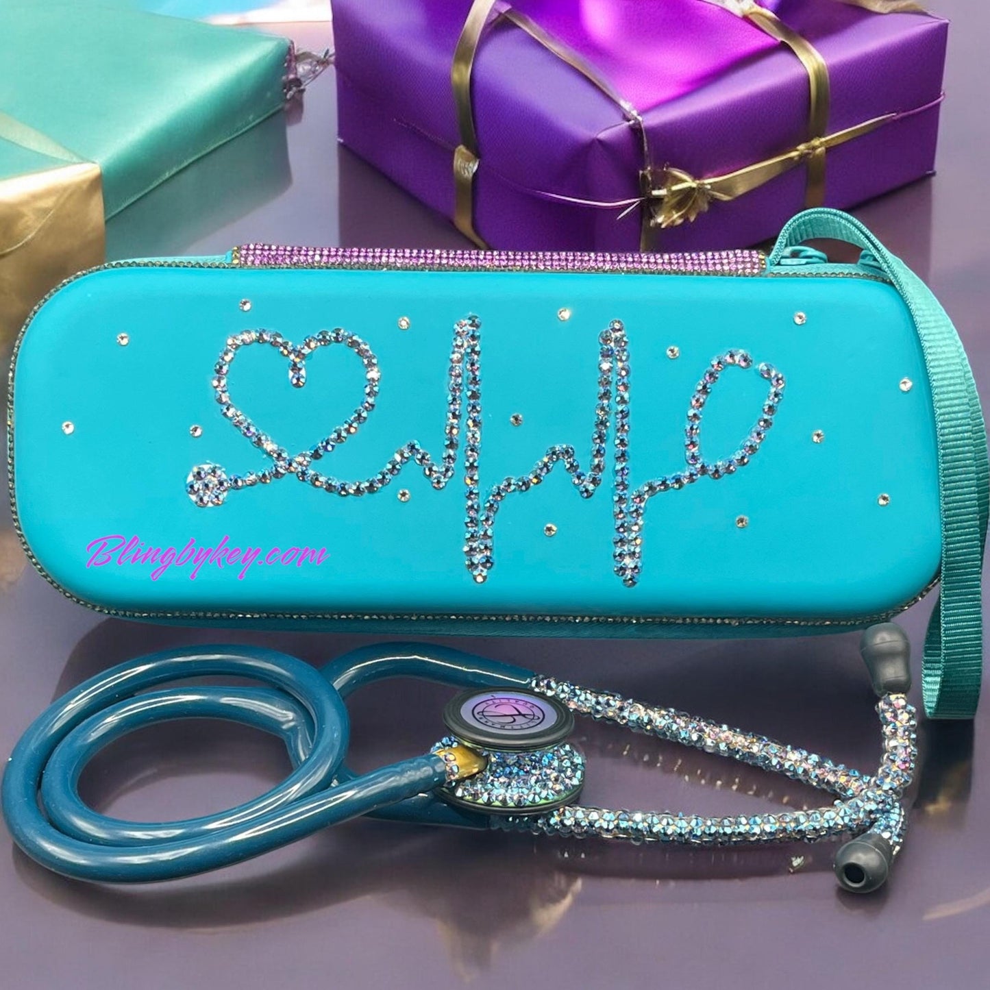 Be the Light Littmann Classic III Stethoscope, Rainbow Finish, Caribbean Blue color tubing, individually placed Crystal AB on the chest piece and headset, with matching protection hard case and personalized name in shimmering purple font.