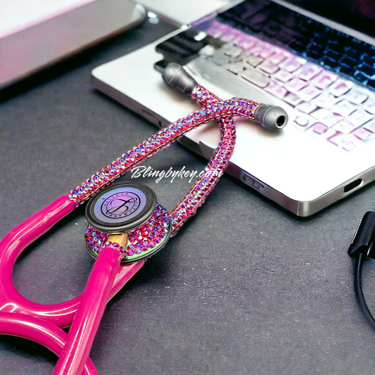 Cotton Candy Littmann Classic III Stethoscope, Rainbow Finish, Raspberry color tubing, individually placed Iridescent rhinestones on the chest piece and headset designed by Blingbykey. See other listings for matching custom protection hard case.