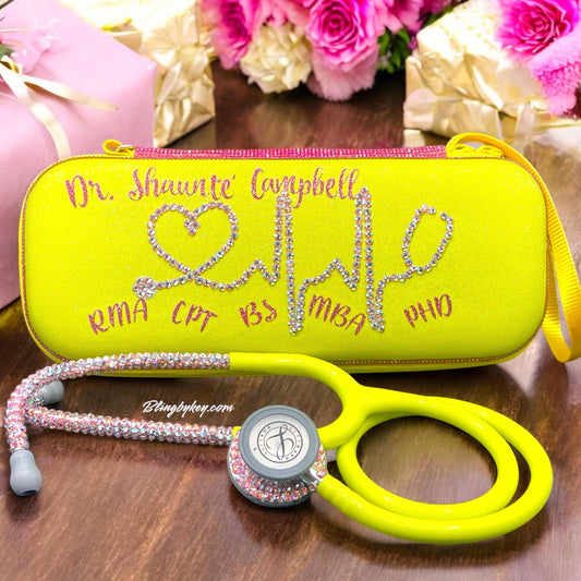 Introducing the &quot;Ray of Sunshine&quot; Littmann Classic III Stethoscope—a fantastic fusion of practicality and flair! With its vibrant yellow tubing, this stethoscope is sure to turn heads. The individually placed pink crystals on the chest piece and headset add a touch of sparkle, making it truly one of a kind. Plus, it comes with a stylish matching hard case and your name beautifully showcased in shimmering pink font. Elevate your medical tools and express your unique personality all at once!