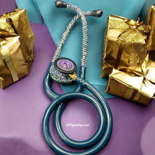 Be the Light Littmann Classic III Stethoscope, Rainbow Finish, Caribbean Blue color tubing, individually placed shimmering crystal AB on the chest piece and headset designed by Blingbykey. See other listings for matching custom protection hard case.